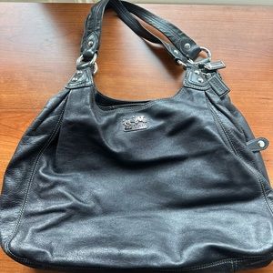 Coach black leather hobo bag with purple satin interior